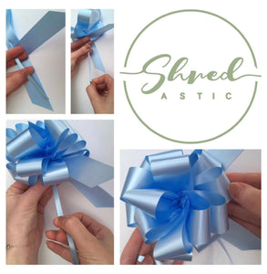 ShredAstic®️ Baby Print Footprints- Florist Cellophane & cream Pull Bow