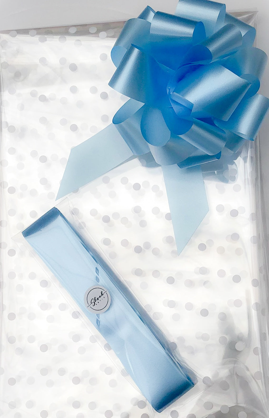 Large Dot Cellophane & Pull Bow