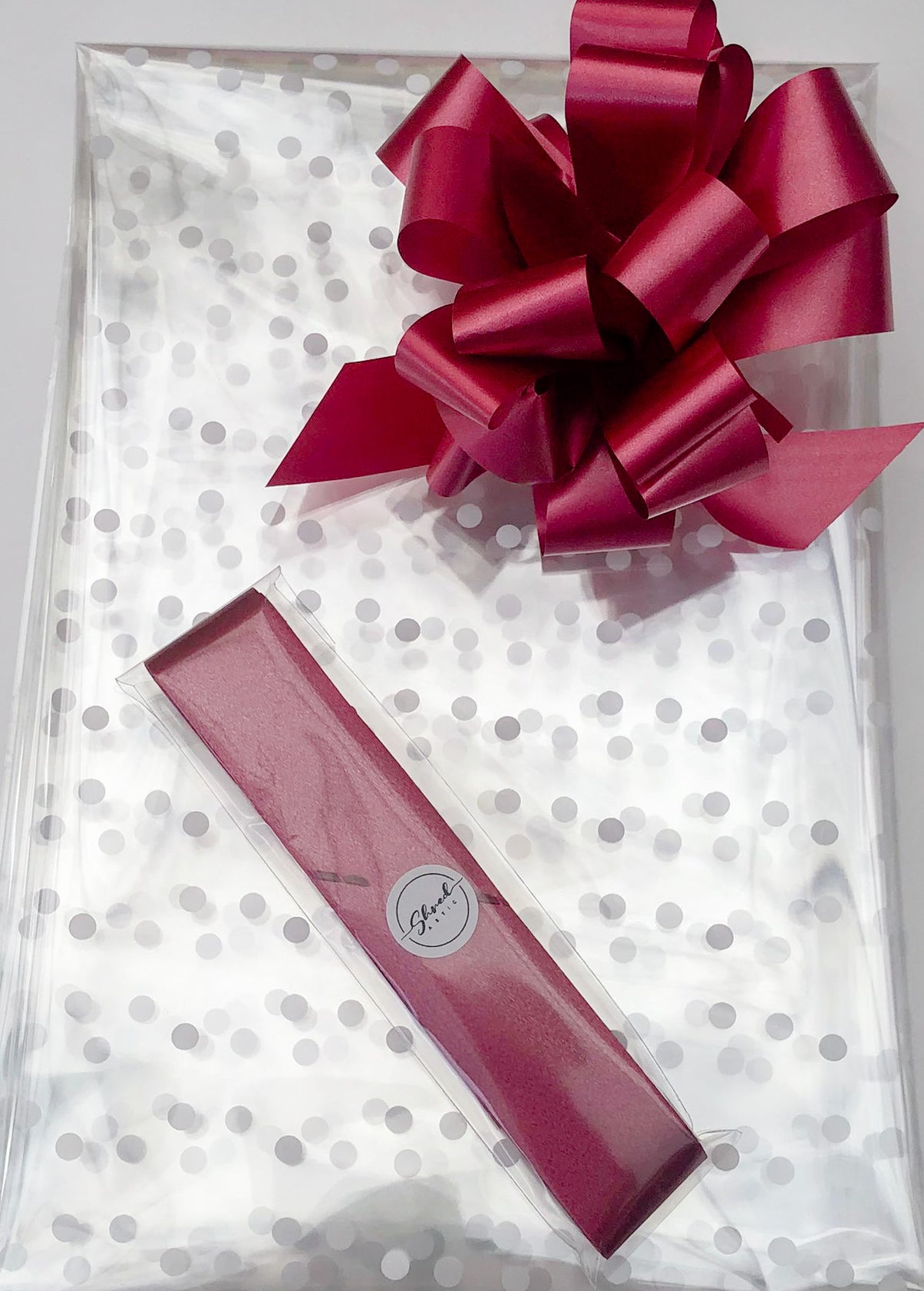 Large Dot Cellophane & Pull Bow