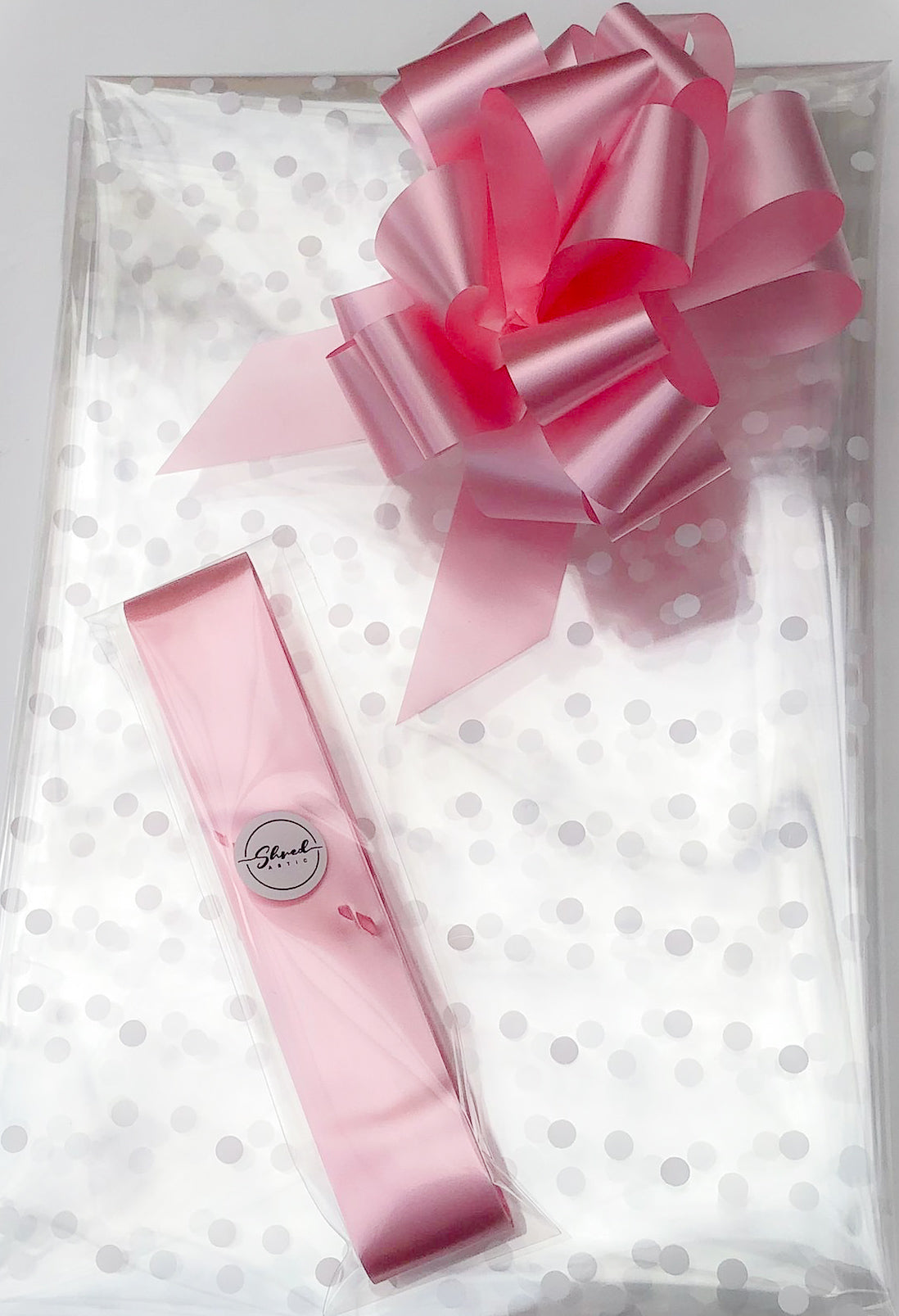 Large Dot Cellophane & Pull Bow
